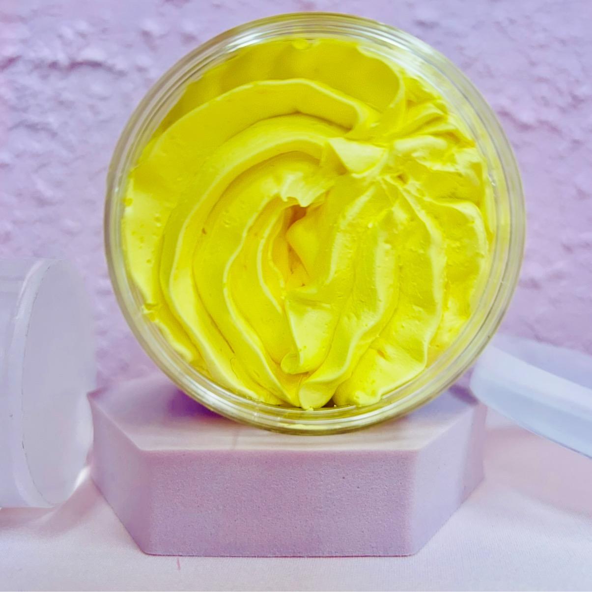 Jar of yellow cream on a pink stand with a pink background